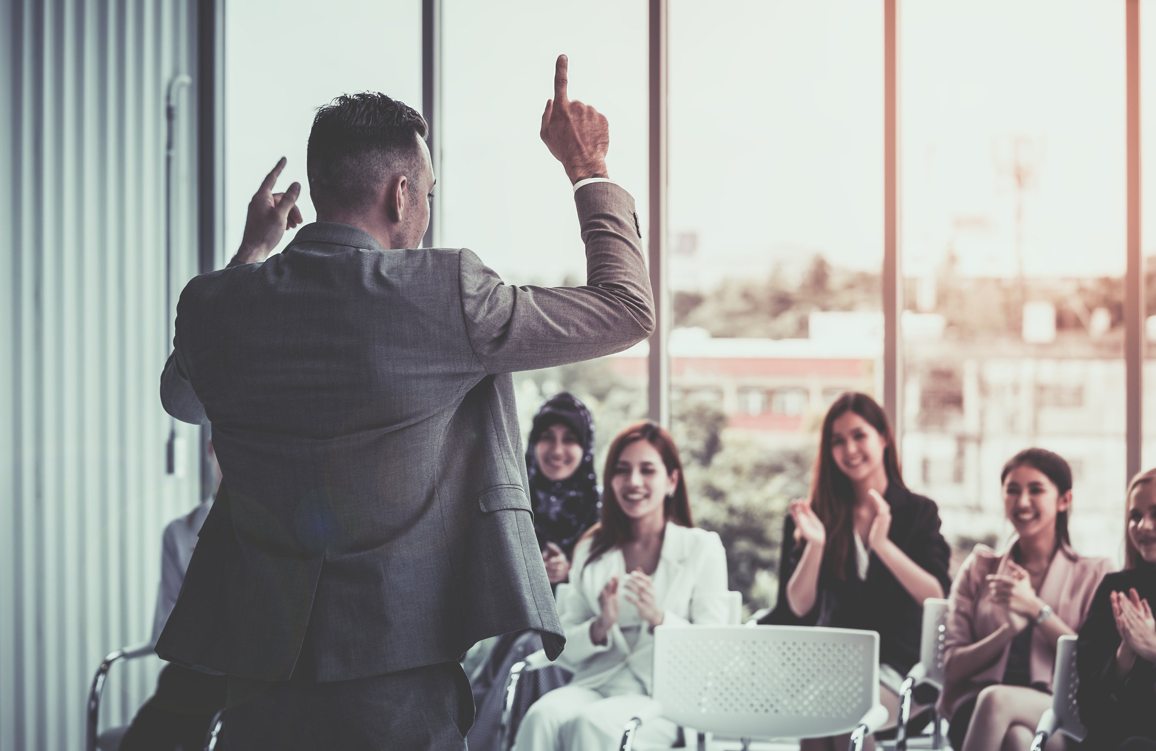 Strong Business Manager giving powerful conference